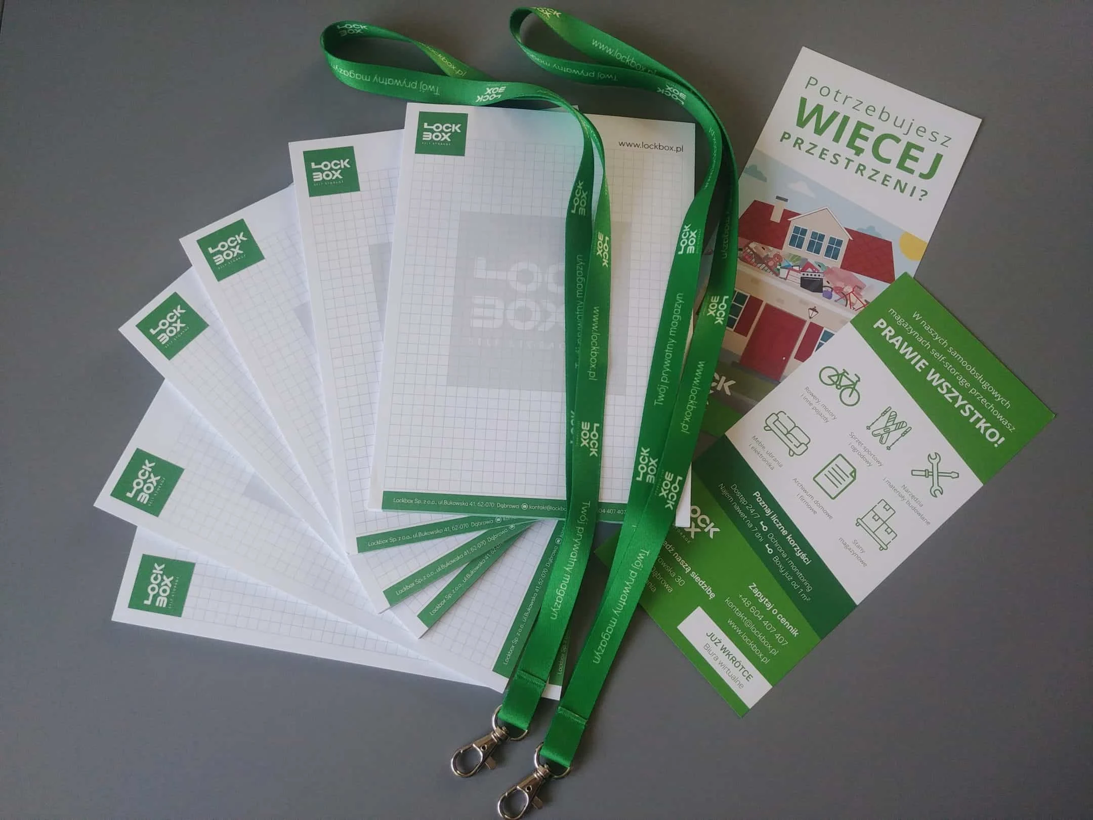 notesy reklamowe i smycze z logo lock box