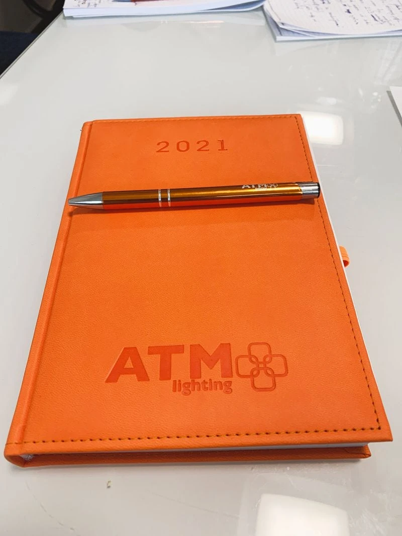 kalendarze książkowe z logo ATM lighting