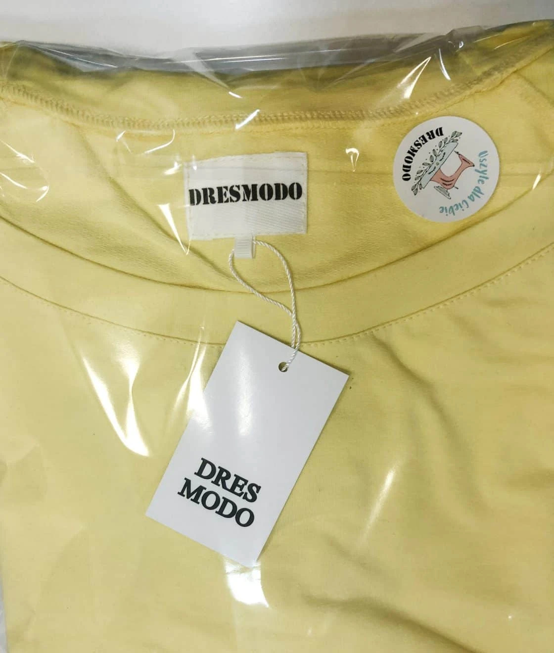 metki na odzieży z logo Dres Modo