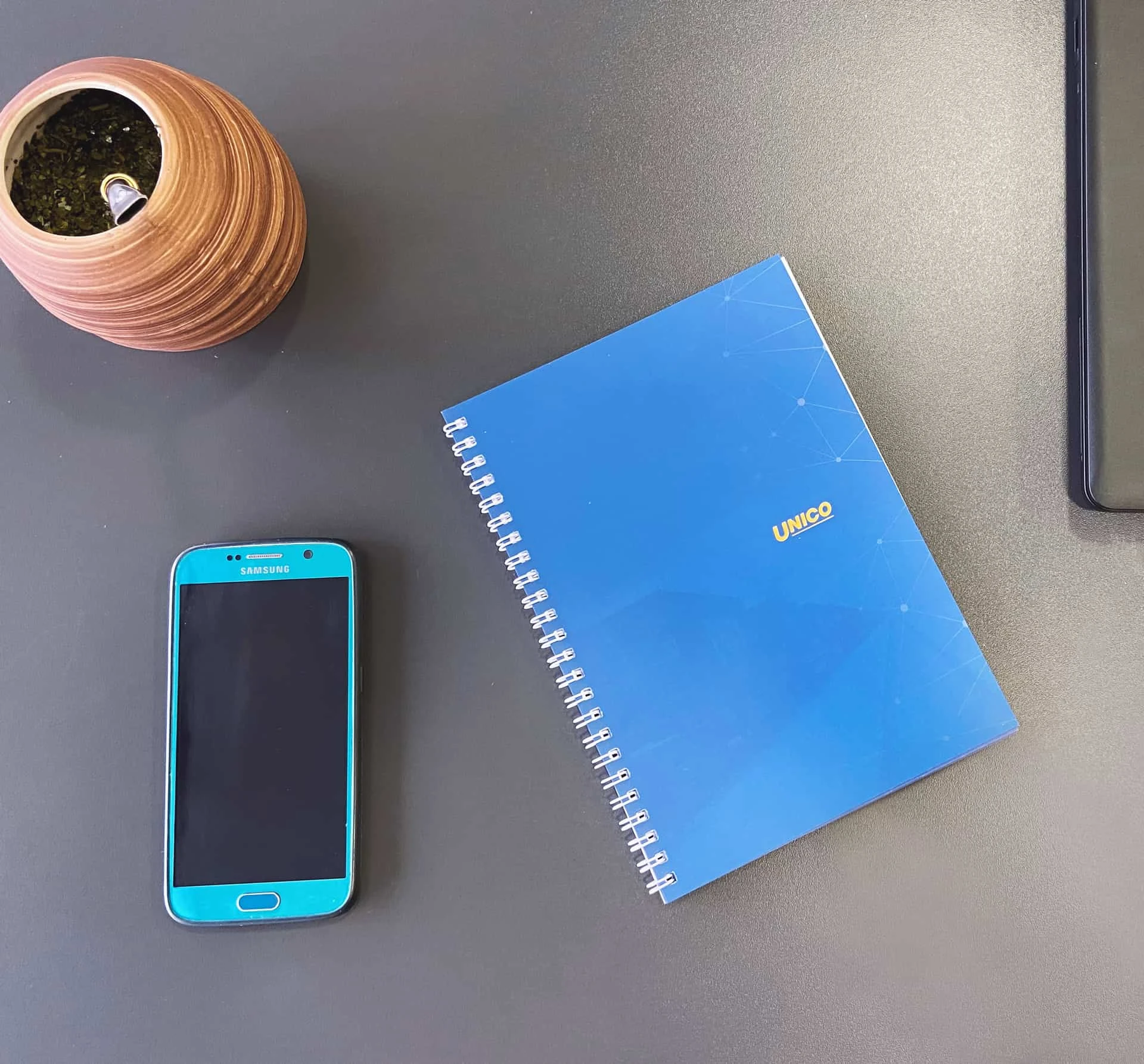 notesy na spirali z logo Unico