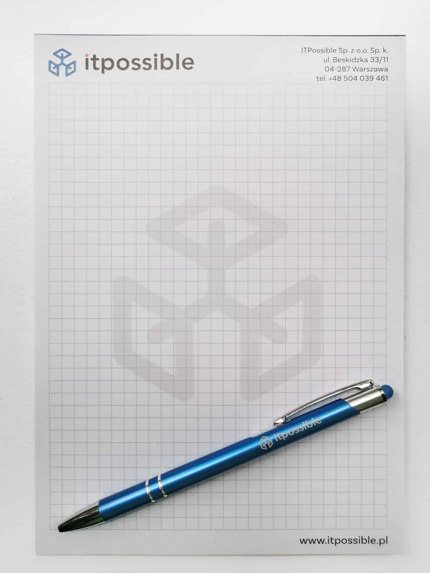 notesy w kratkę z logo firmy itpossible