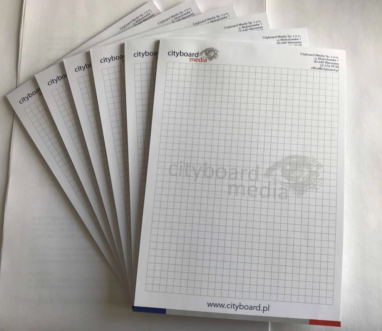 notesy firmowe w kratkę z logo cityboard media
