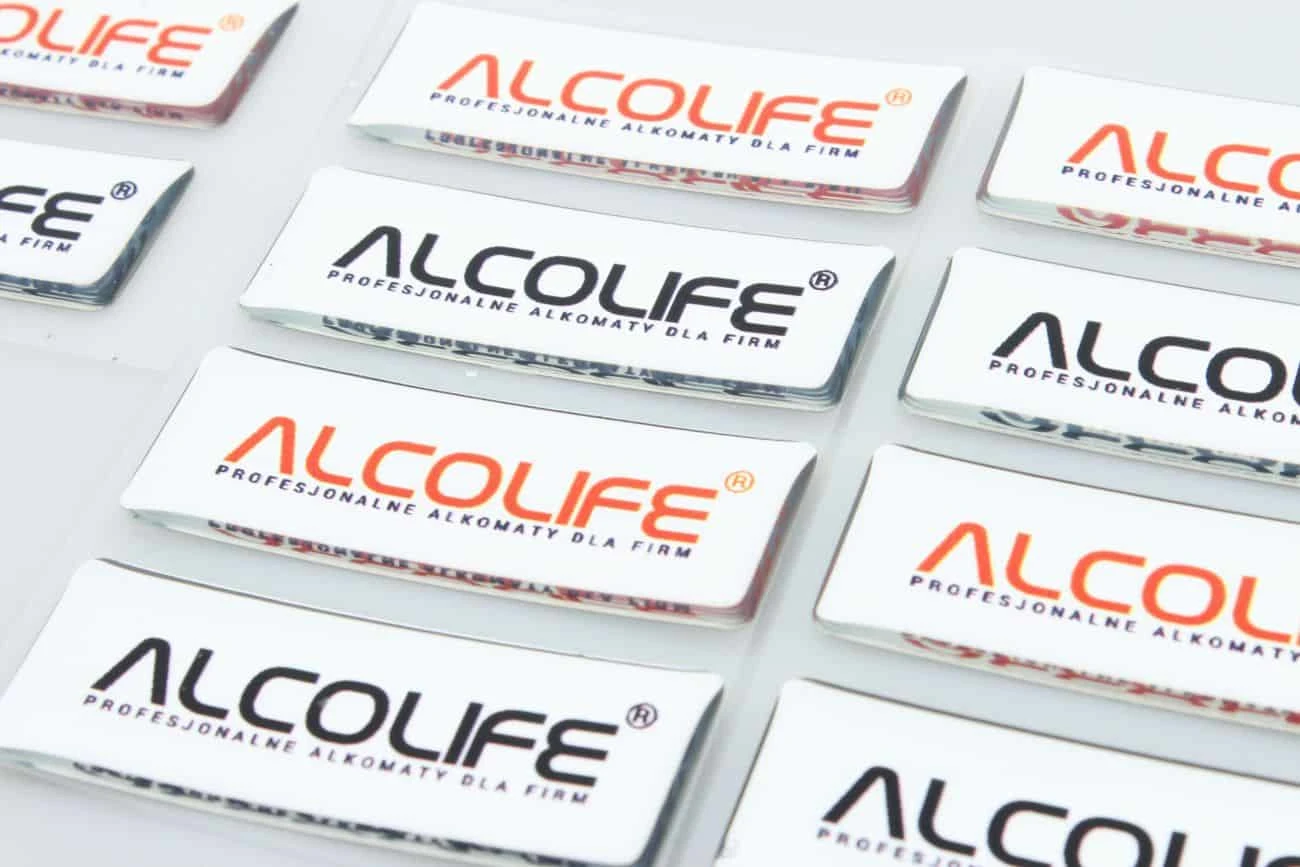 naklejki srebrne wypukłe z logo Alcolife